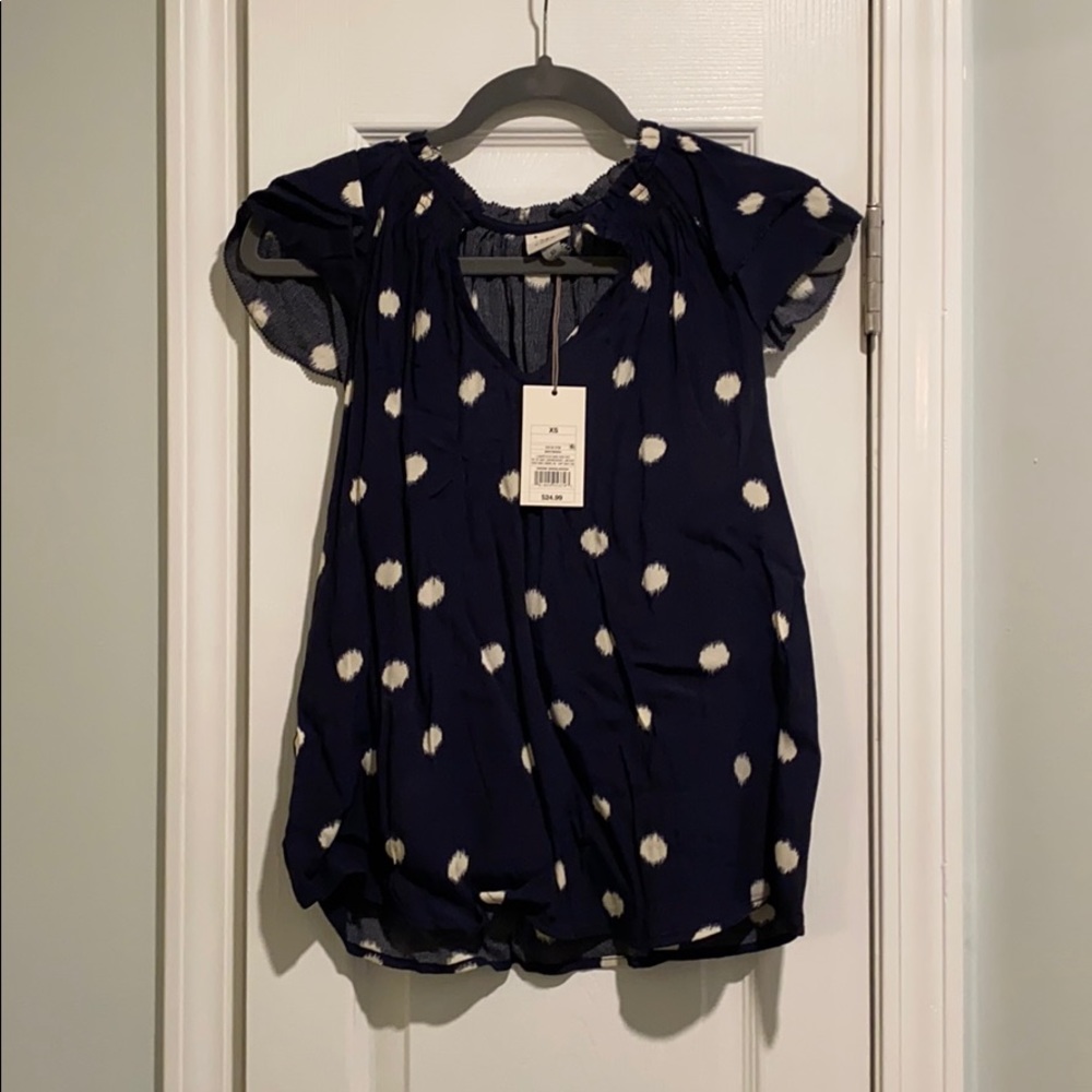 Navy polka dot blouse